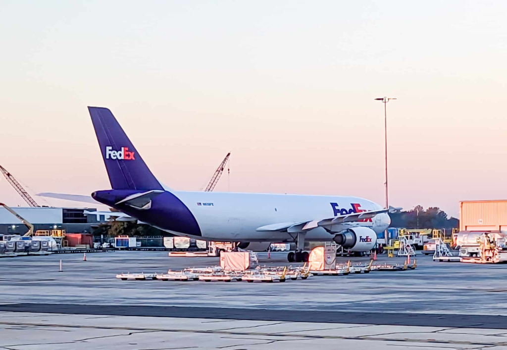 FedEx climbs as profit guidance eases holiday season worries